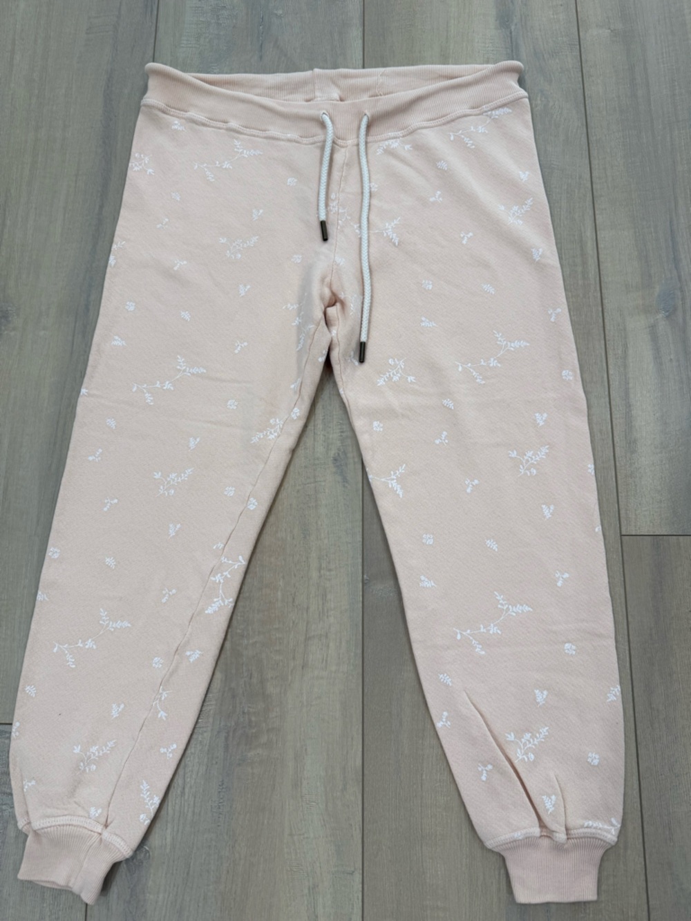 THE GREAT. Light Peach Floral Drawstring Sweatpants